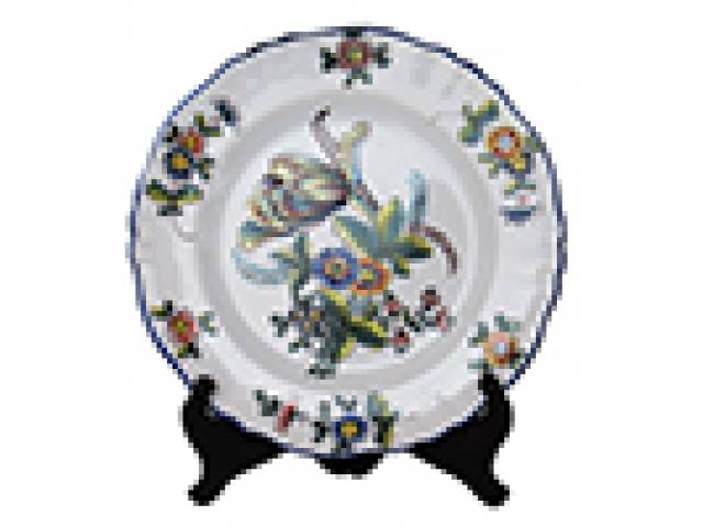 Prato faiança “Luneville K&G St. Clements” borda azul e motivos florais. d = 24 cm. - França, início do séc. XX
