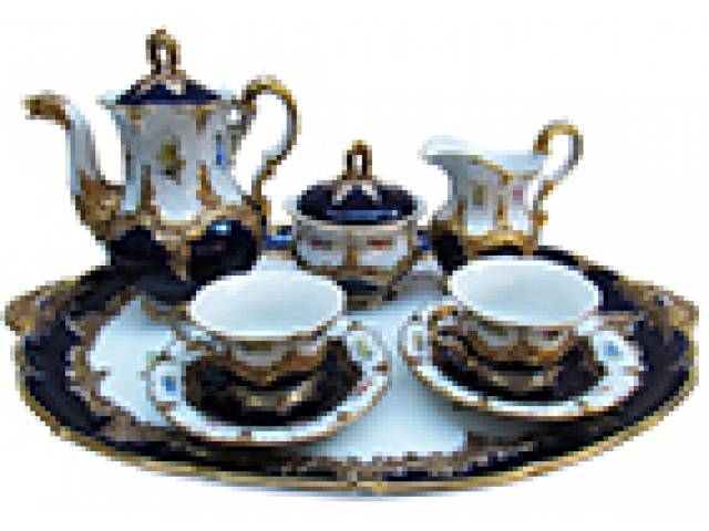 Serviço de café tête-à-tête e presentoir (48 cm) porc. B-Form Meissen, azul cobalto com guarnição dourada, números coloridos incisos, impressos e overglaze, 8 peças. - Alemanha, séc. XX. Obs. leiteira apresenta fio de cabelo.